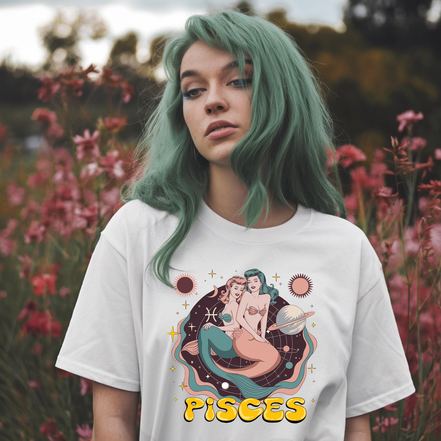 Vintage white Pisces zodiac t-shirt featuring a retro twin fish graphic. Water sign astrology apparel.
