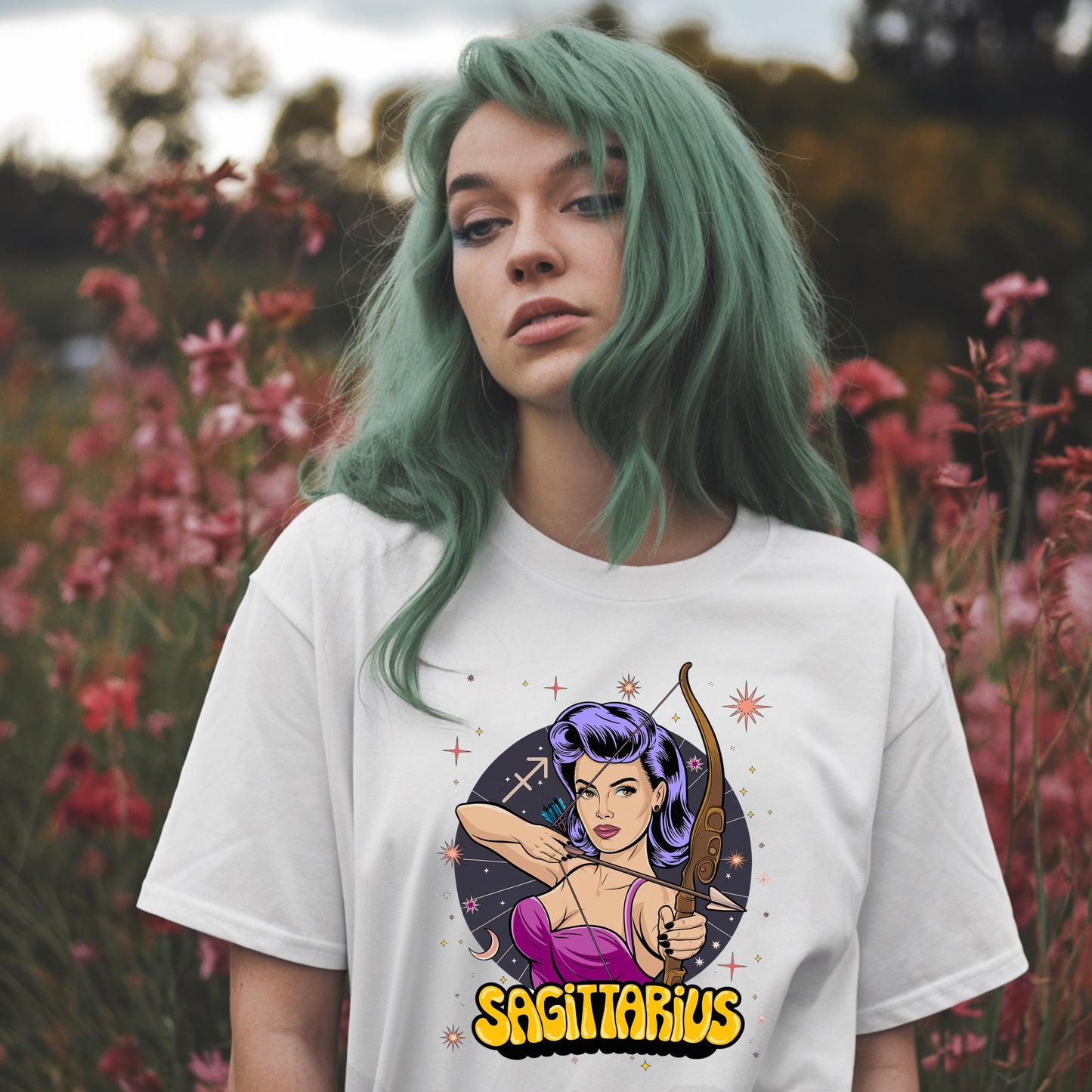 White retro Sagittarius t-shirt print: colorful vintage woman archer with constellations & symbol. Jupiter ruled star sign top.